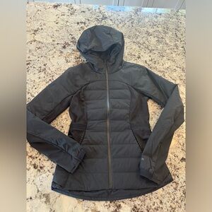 Black running jacket. Never worn. Basically brand new.